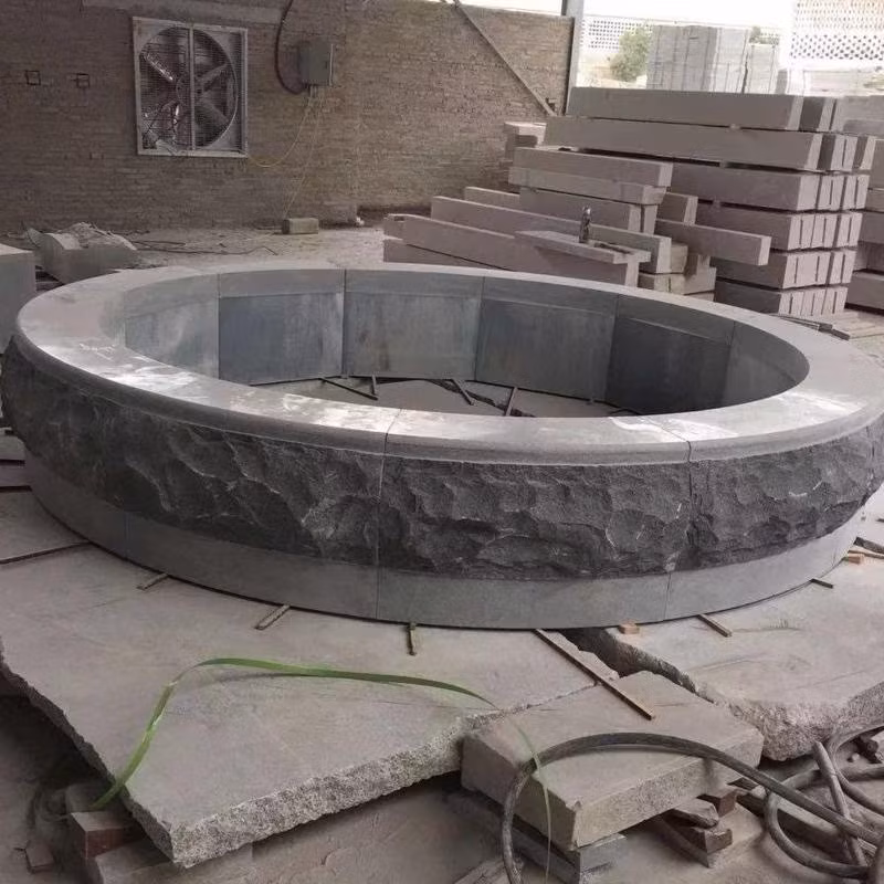 Bàn tròn chạm khắc tay từ đá granit hình ảnh 16-description