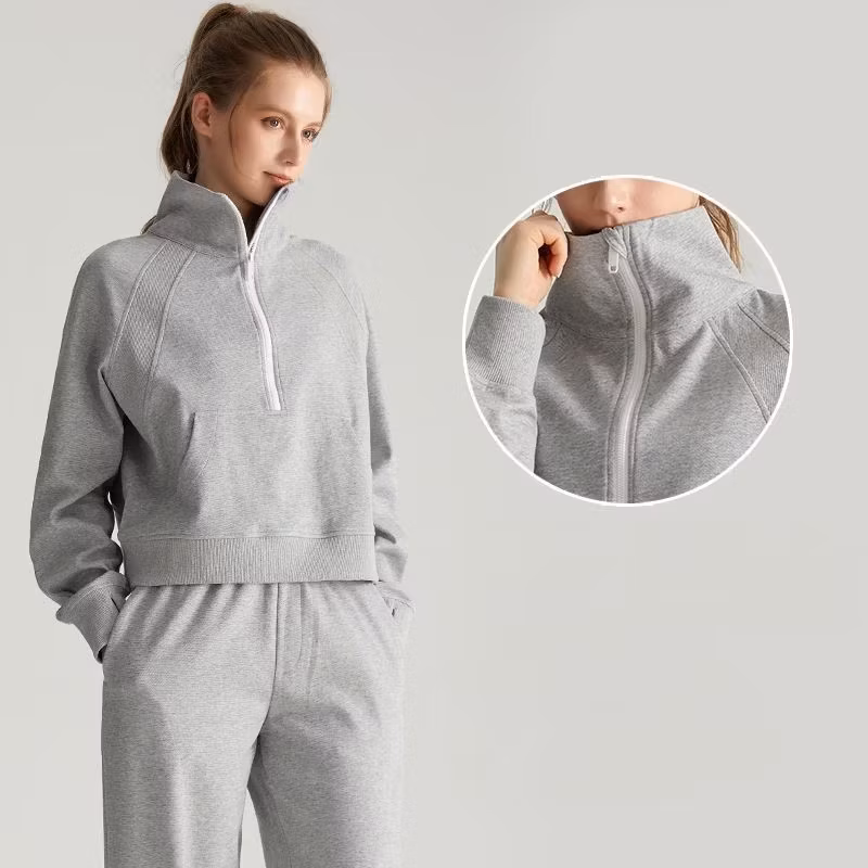 Bộ thể thao nữ mùa thu với áo dài tay rộng có khóa kéo và cổ đứng kèm quần chạy thể thao hình ảnh 17-description