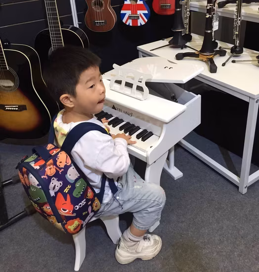Đàn piano màu trắng dành cho bé, sản phẩm chơi đồ chơi âm nhạc