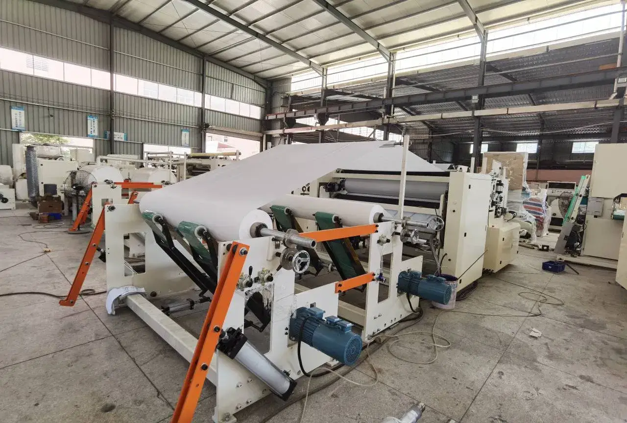 Thiết bị tự động sản xuất cuộn giấy lau tay