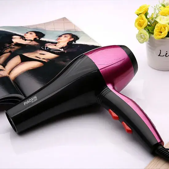 Máy sấy tóc gia đình công suất mạnh, với chế độ gió nóng và lạnh, duy trì nhiệt độ ổn định