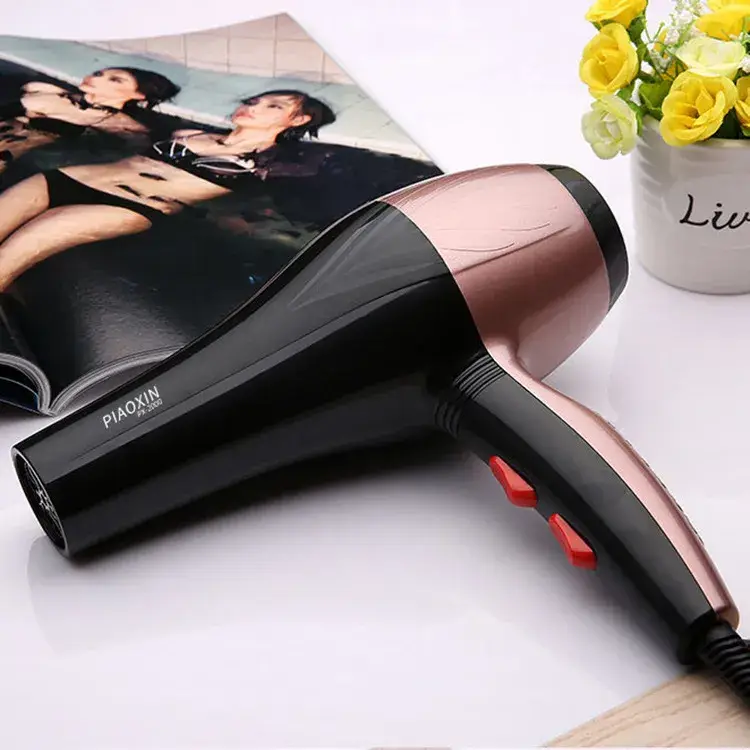 Máy sấy tóc gia đình công suất mạnh, với chế độ gió nóng và lạnh, duy trì nhiệt độ ổn định