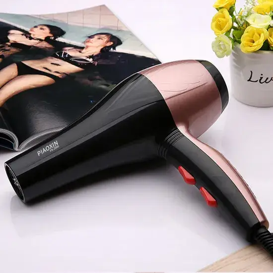Máy sấy tóc gia đình công suất mạnh, với chế độ gió nóng và lạnh, duy trì nhiệt độ ổn định