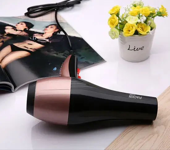 Máy sấy tóc gia đình công suất mạnh, với chế độ gió nóng và lạnh, duy trì nhiệt độ ổn định