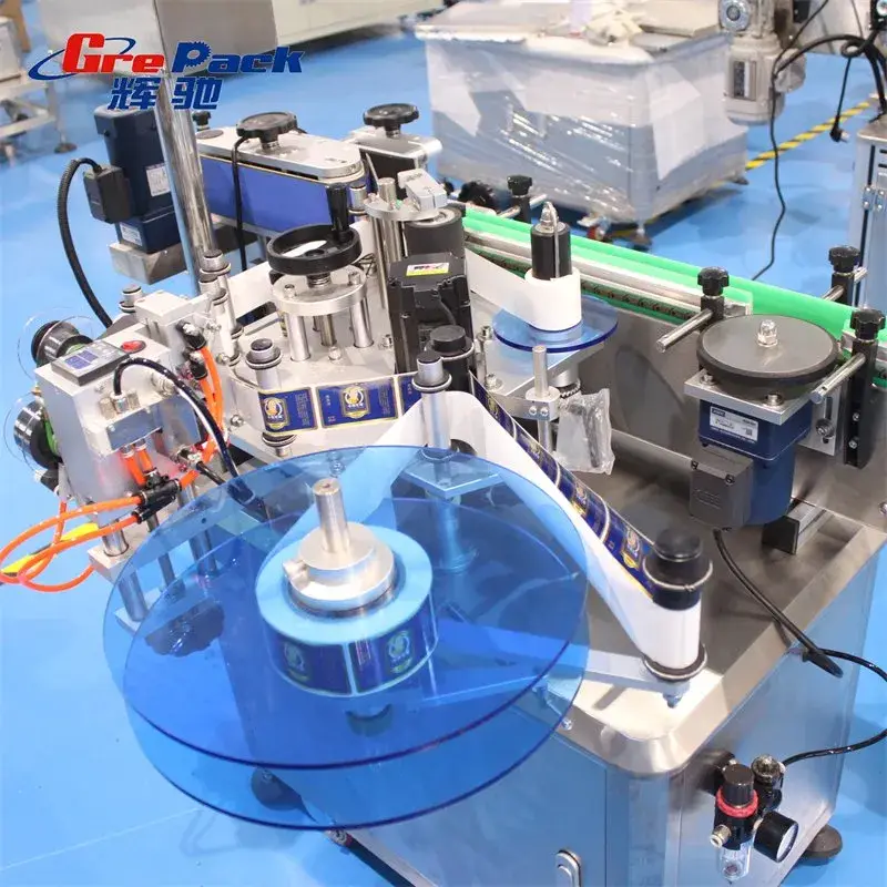 Máy dán nhãn tự động cho chai rượu tròn
