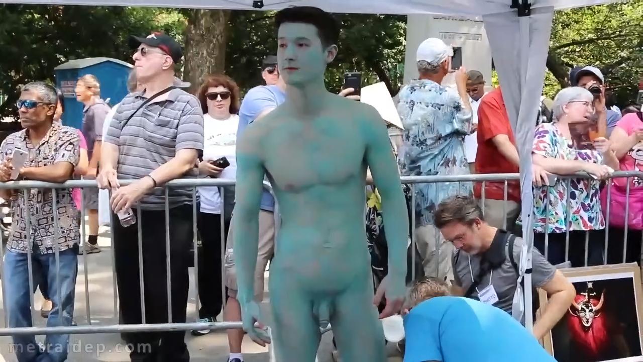 porn Naked handsome man acts as a model for an artist to paint his body