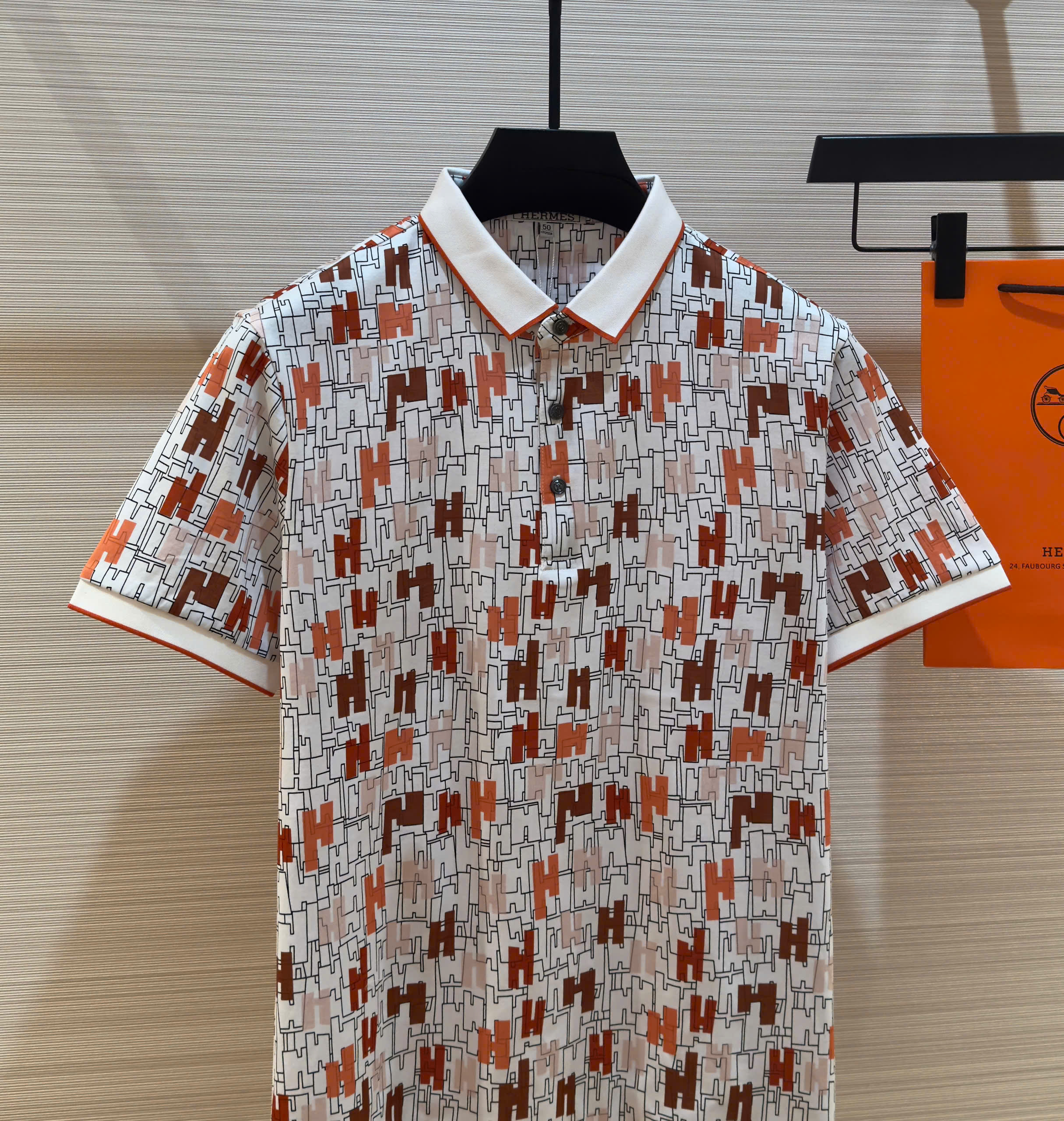 Áo polo Hermes HM Trắng họa tiết logo H full Like Auth 1-1 on web DDT