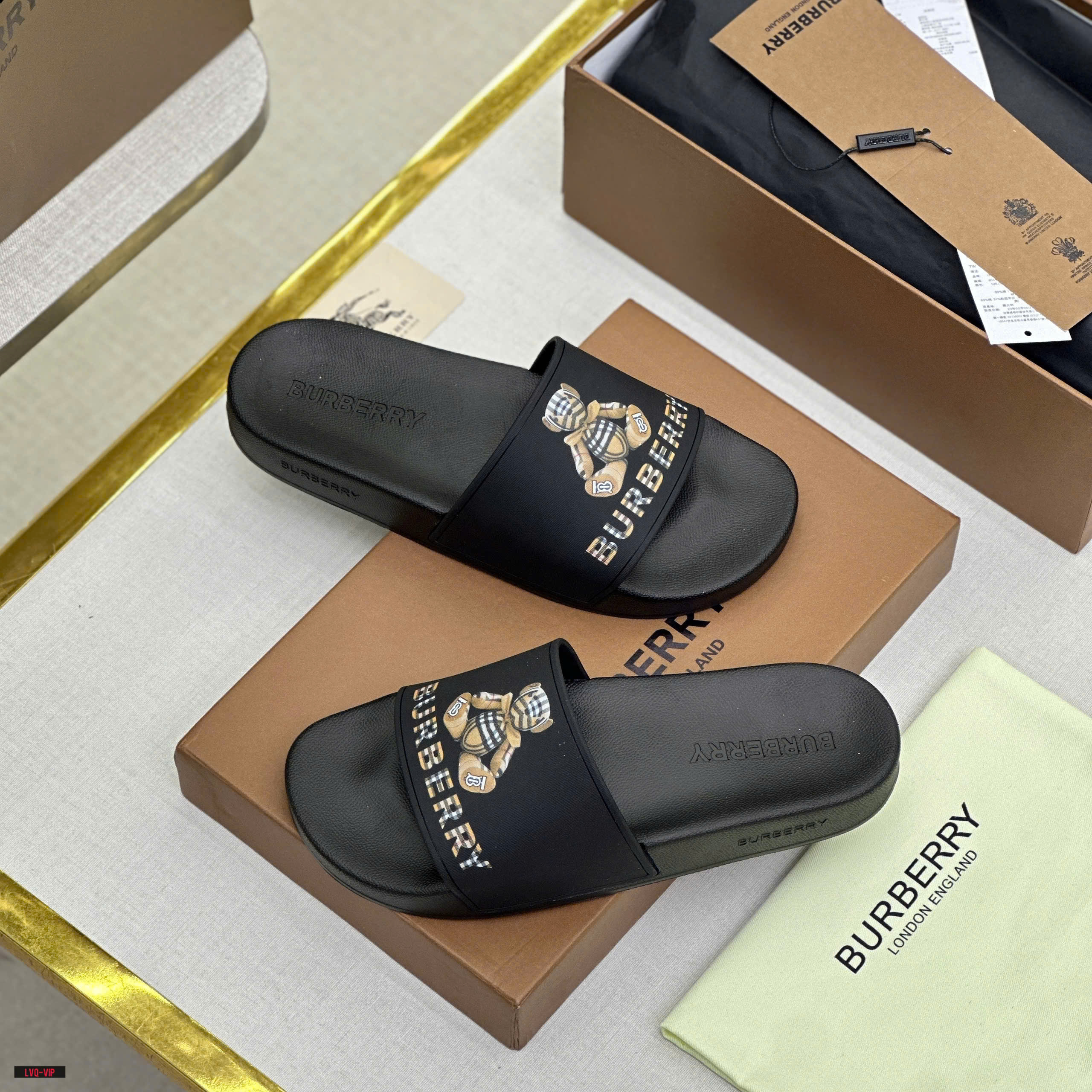 Dép lê quai ngang Burberry BBR Đen logo chữ gấu Nâu kẻ sọc Like Auth on web fullbox bill thẻ LVQ