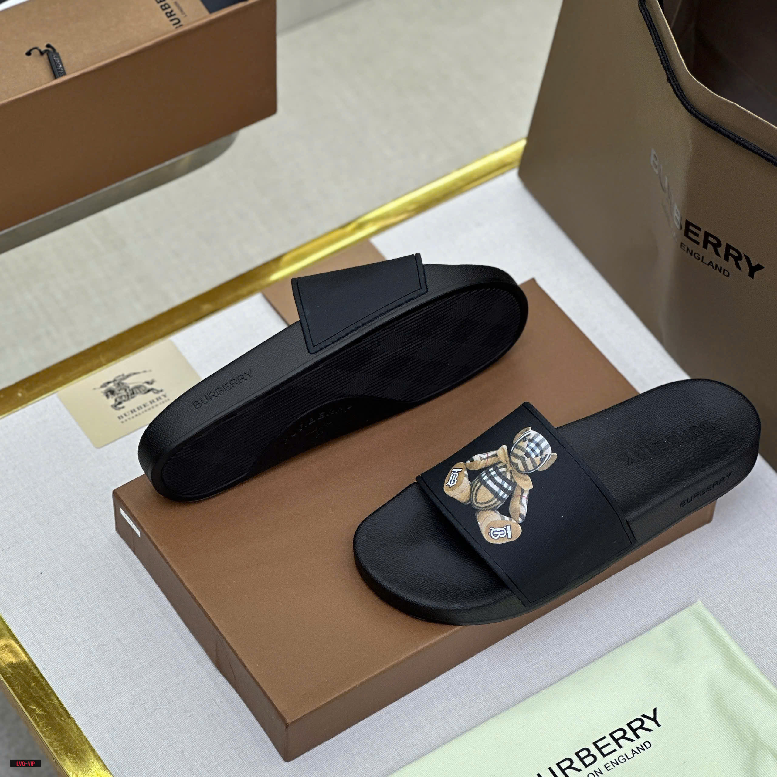 Dép lê quai ngang Burberry BBR Đen logo gấu Nâu kẻ sọc Like Auth on web fullbox bill thẻ LVQ