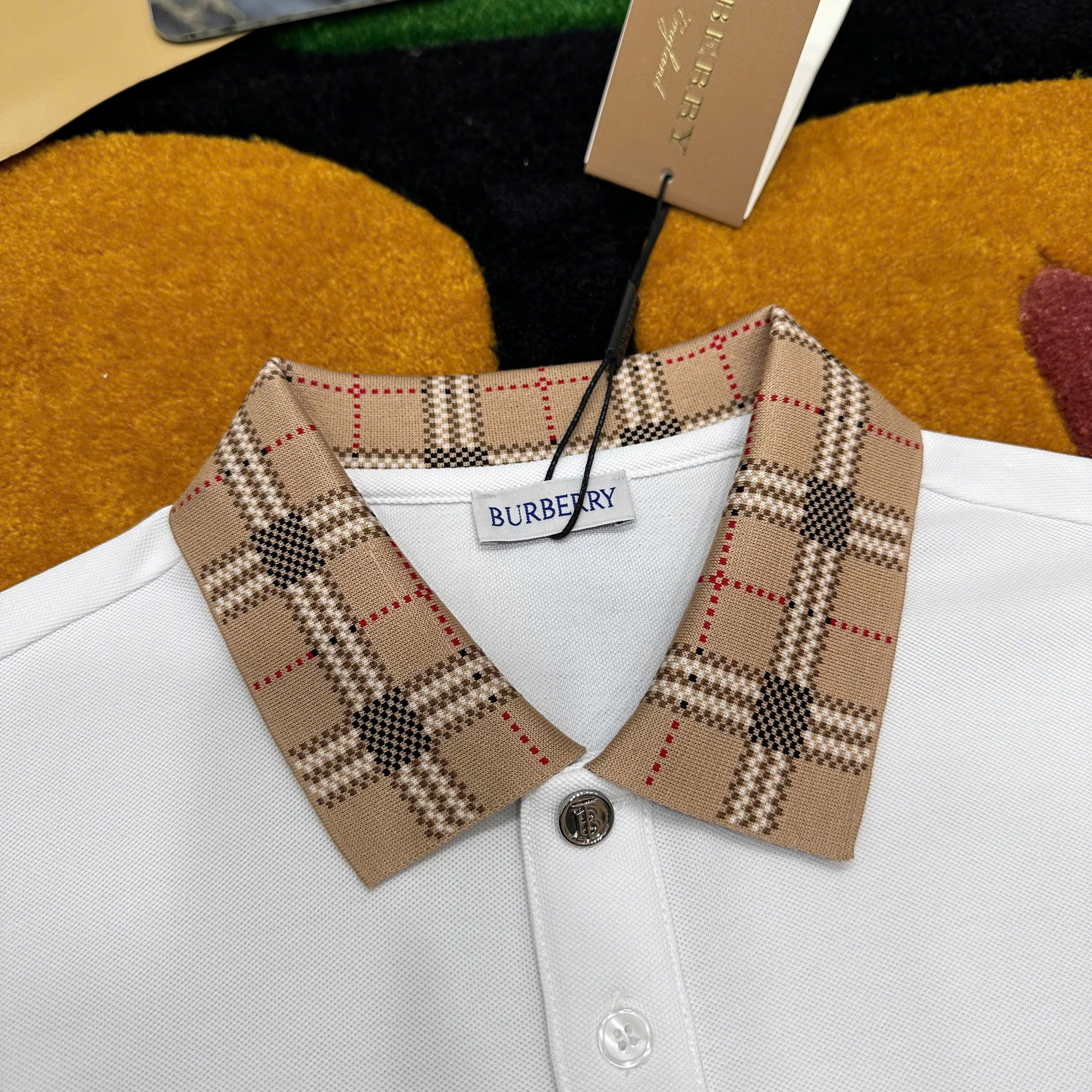 Áo polo Burberry logo thêu ngực phối kẻ sọc cổ tay Nâu Like Auth 1-1 on web MK