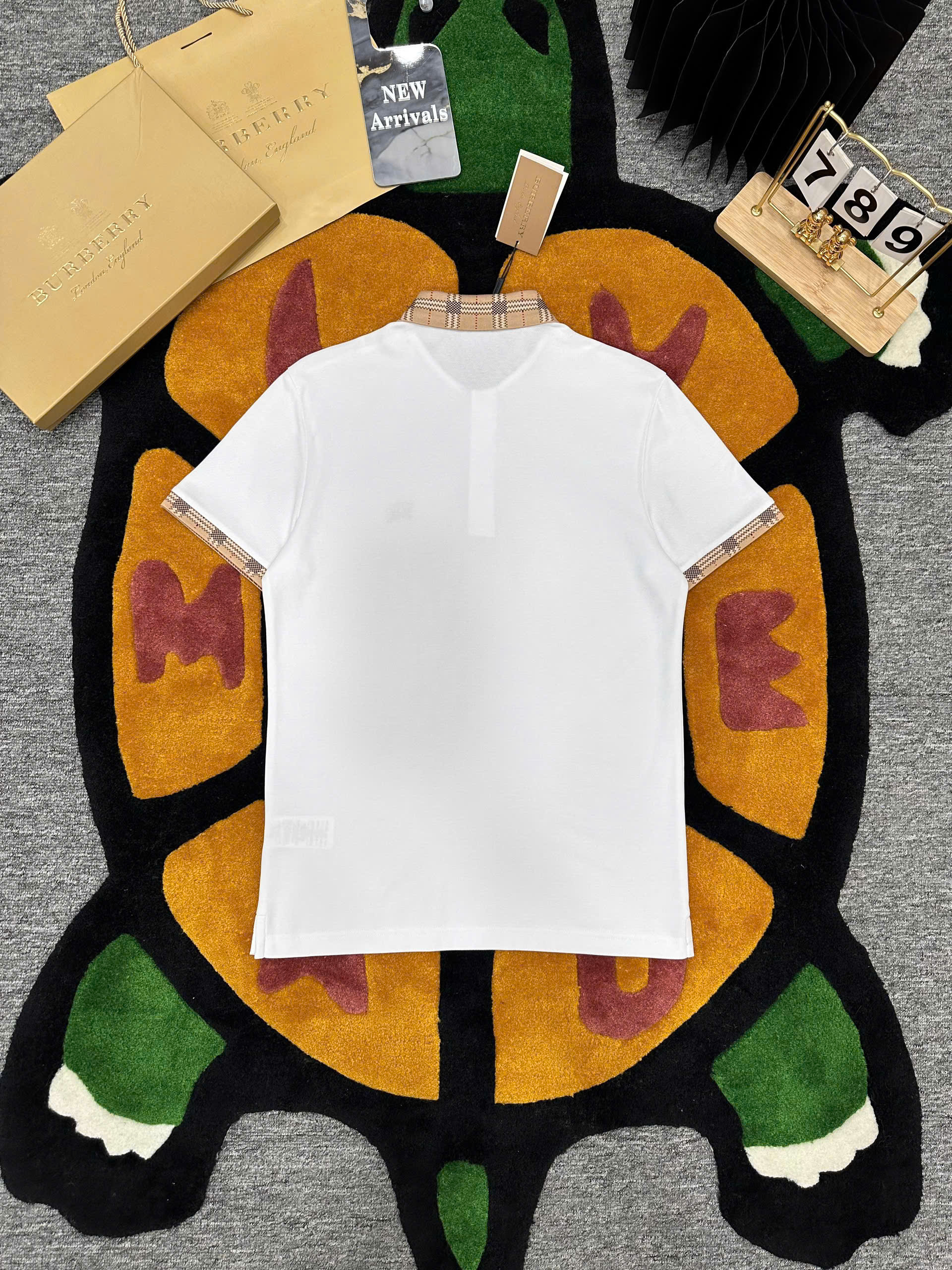 Áo polo Burberry logo thêu ngực phối kẻ sọc cổ tay Nâu Like Auth 1-1 on web MK