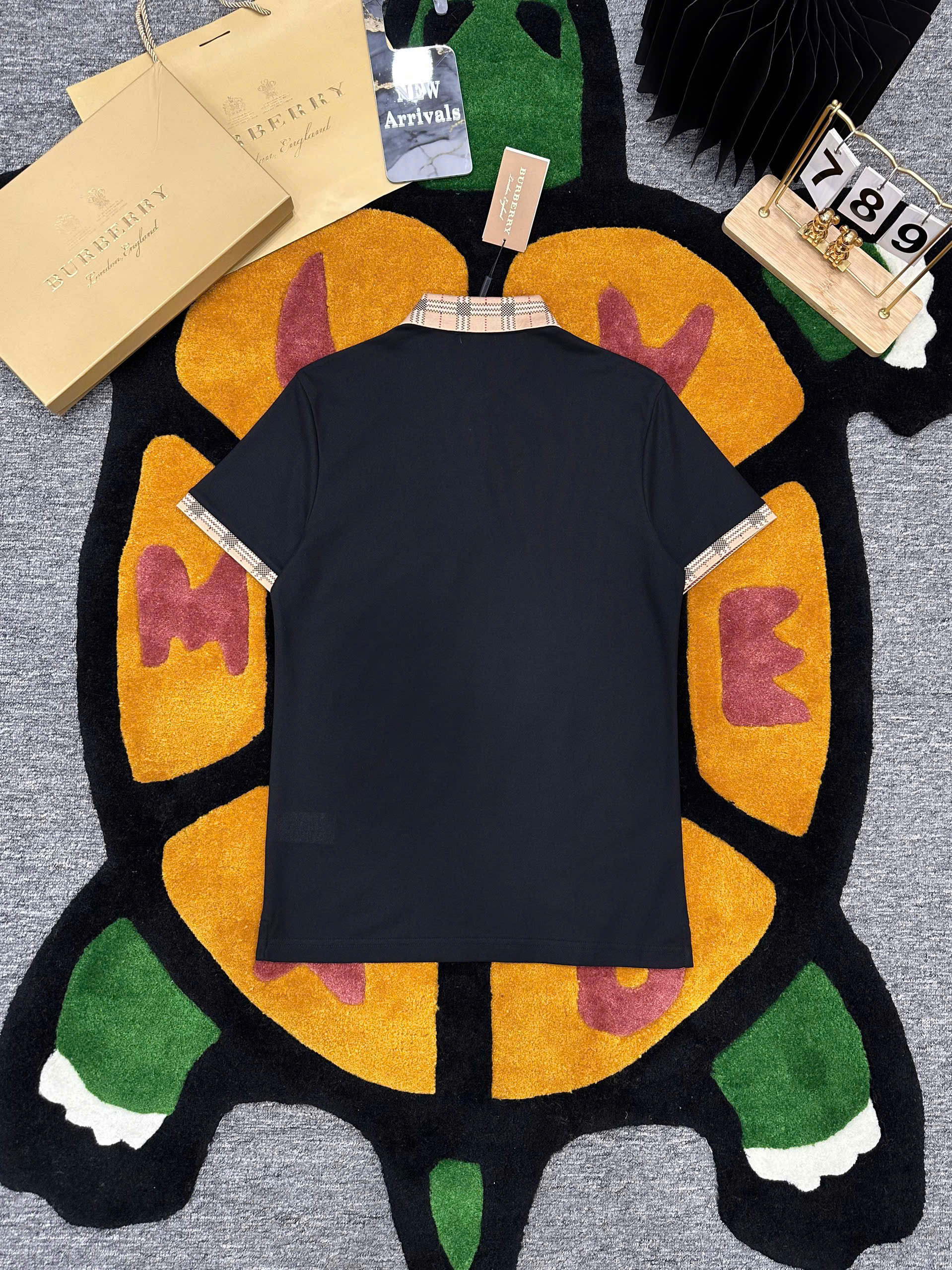 Áo polo Burberry logo thêu ngực phối kẻ sọc cổ tay Nâu Like Auth 1-1 on web MK