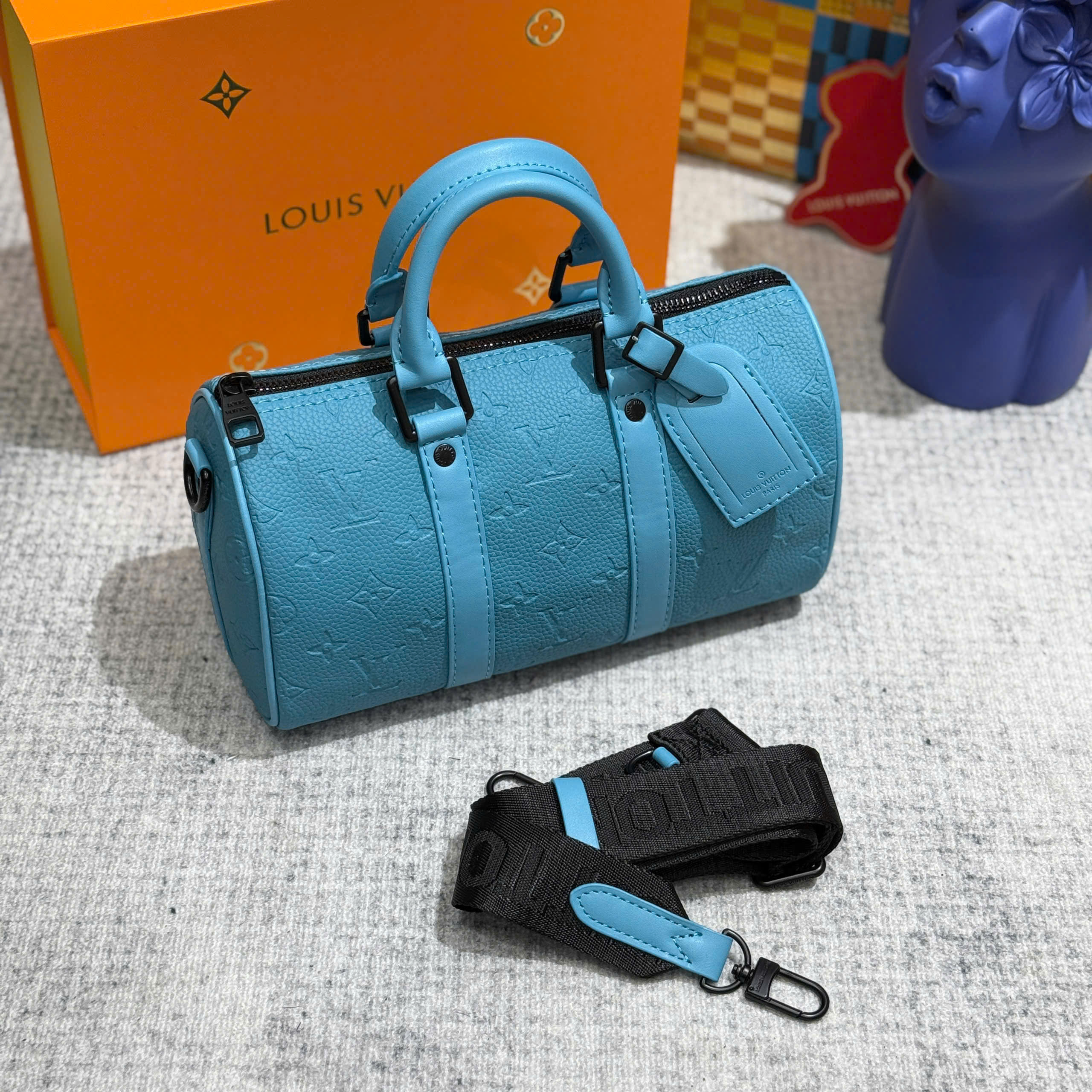 Túi trống mini đeo chéo, cầm tay Louis Vuitton LV Xanh dương họa tiết hoa vân logo dập chìm size 25x15x11cm Like Auth on web fullbox bill thẻ PLD
