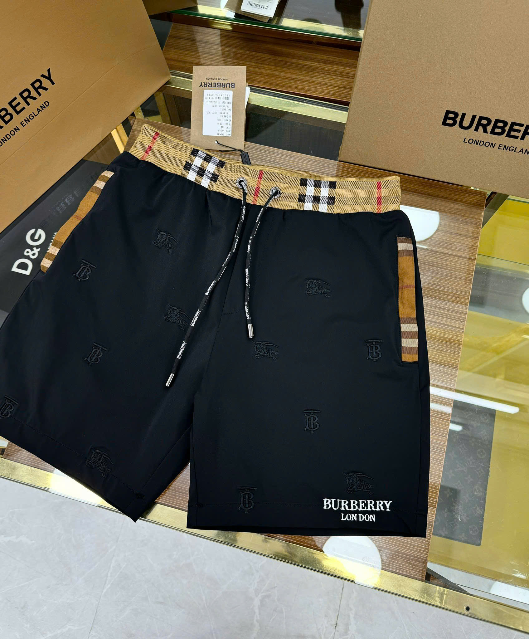 Quần short gió Burberry BBR họa tiết thêu phối kẻ sọc logo chữ thêu đùi Like Auth 1-1 on web CD