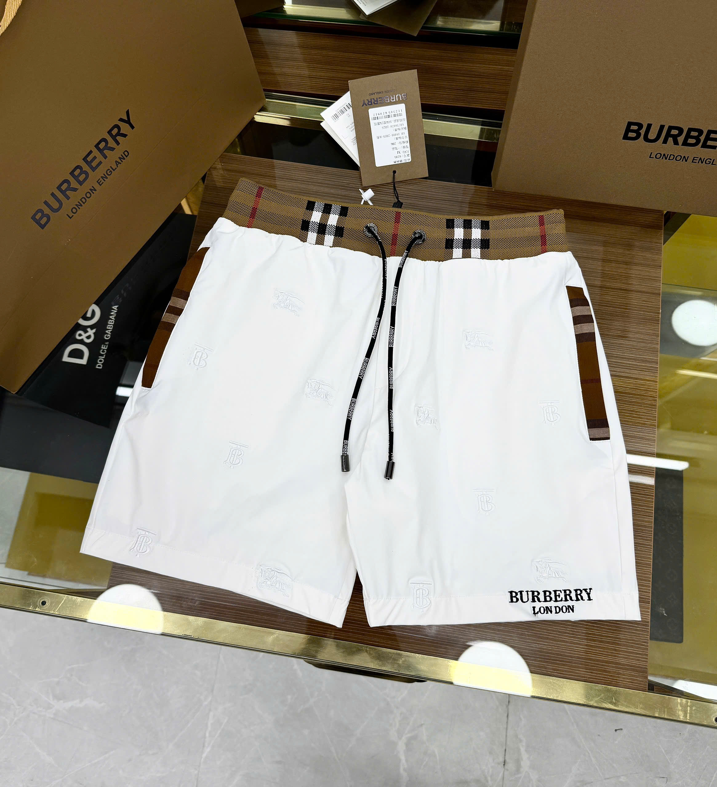 Quần short gió Burberry BBR họa tiết thêu phối kẻ sọc logo chữ thêu đùi Like Auth 1-1 on web CD
