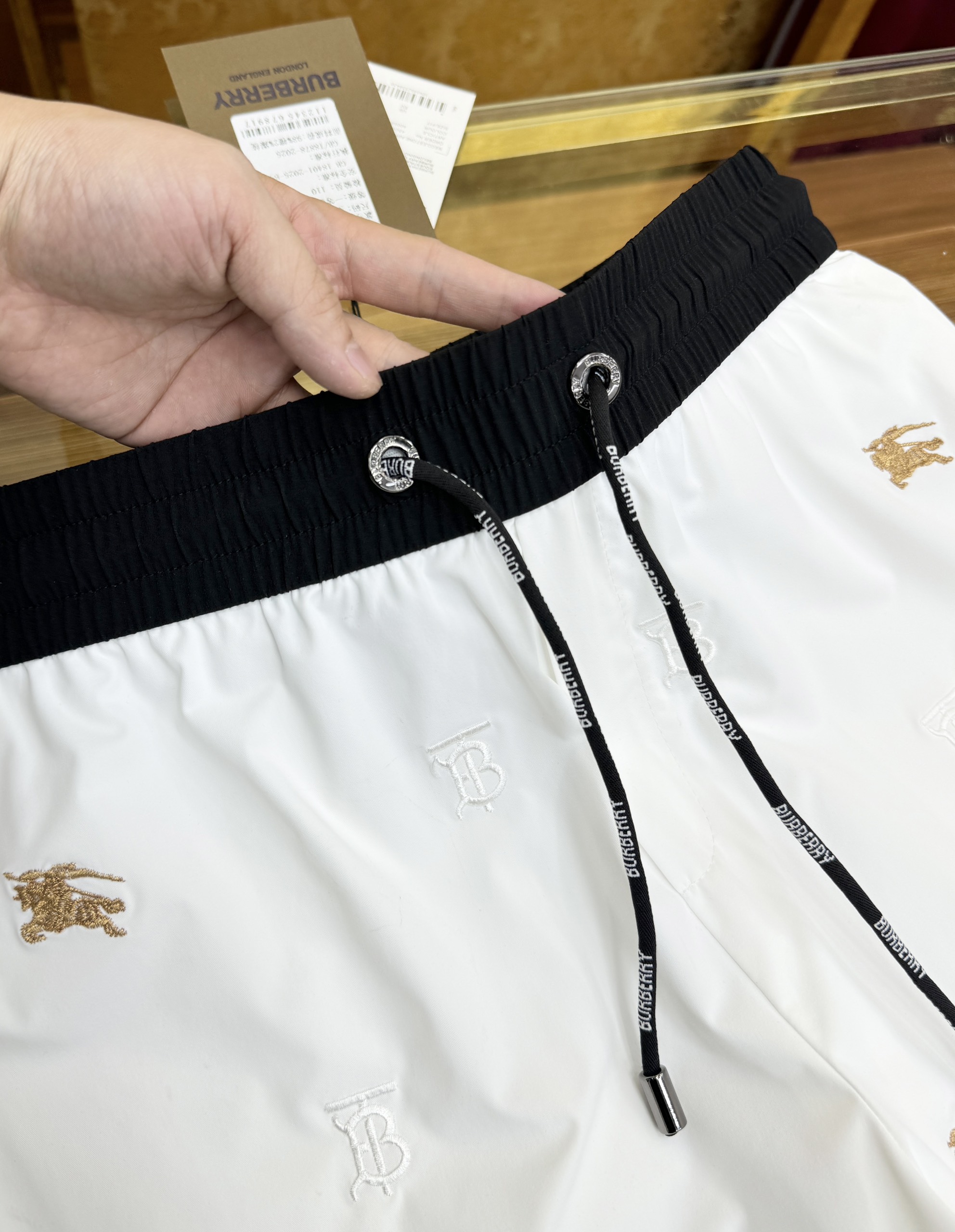 Quần short gió Burberry BBR họa tiết logo TB lính cưỡi ngựa thêu full Like Auth 1-1 on web CD MK