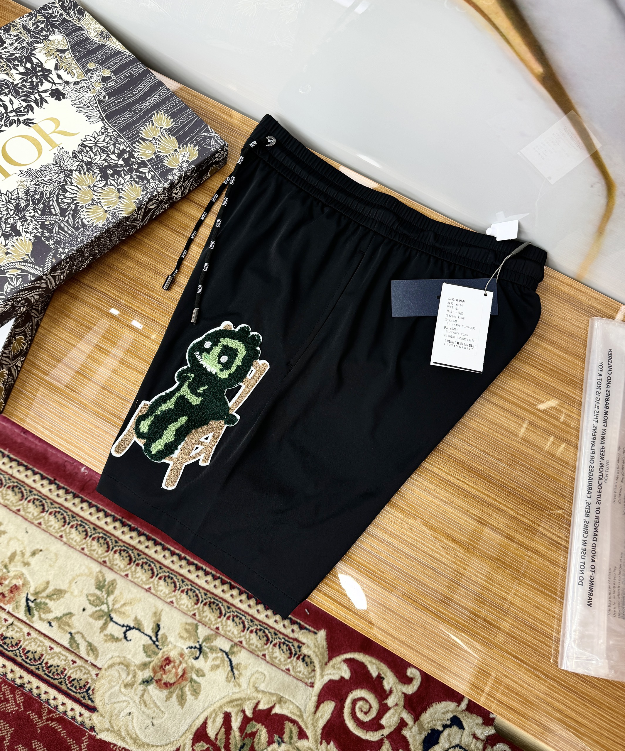 Quần short gió Dior CD Đen logo thêu xù Like Auth 1-1 on web CD