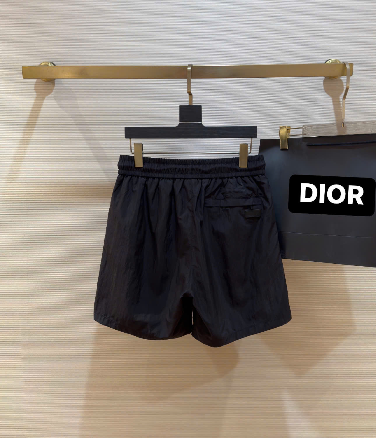 Quần short gió Dior CD Đen họa tiết logo Ong thêu Like Auth DDT