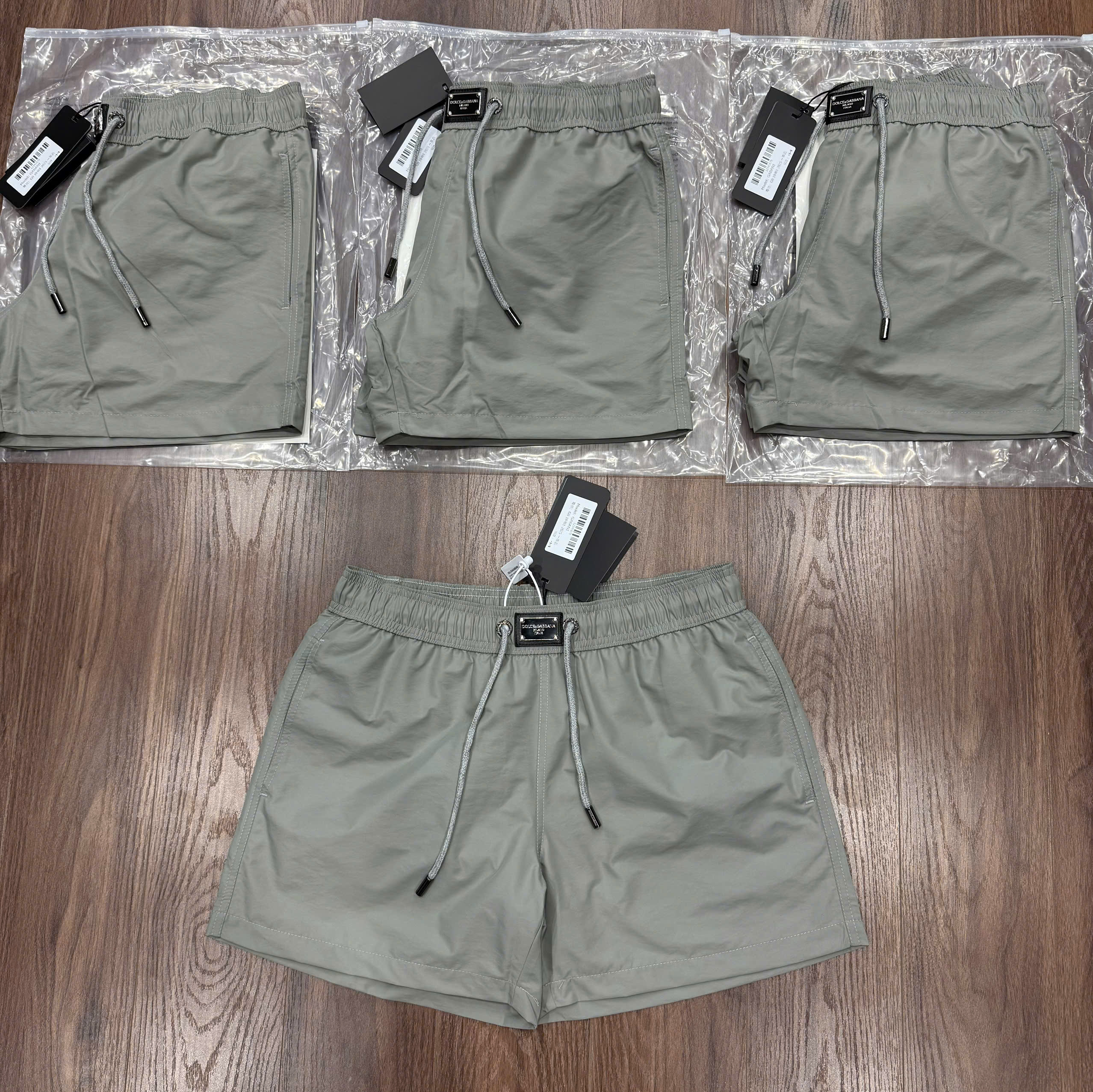 Quần short gió Dolce Gabbana DG trơn logo tag vuông cạp Like Auth CD