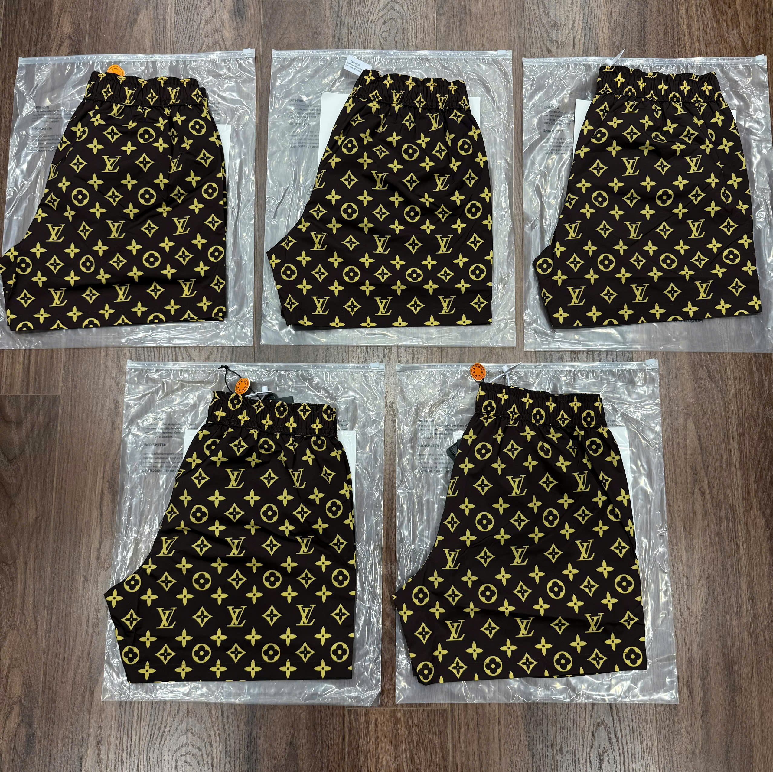 Quần short gió Louis Vuitton LV Nâu họa tiết hoa vân logo Nâu Like Auth CD