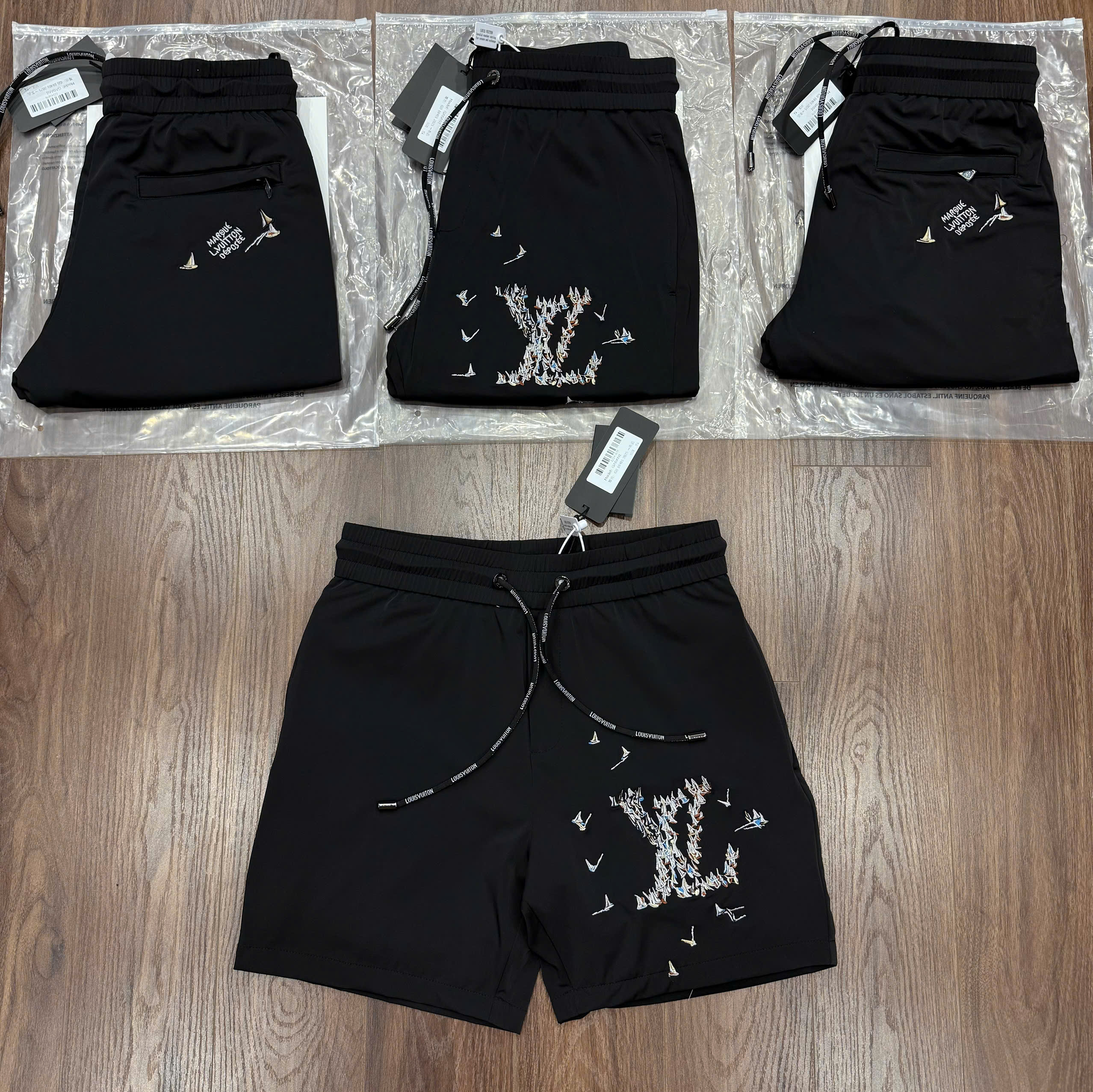 Quần short gió Louis Vuitton LV Đen logo họa tiết thuyền Like Auth CD