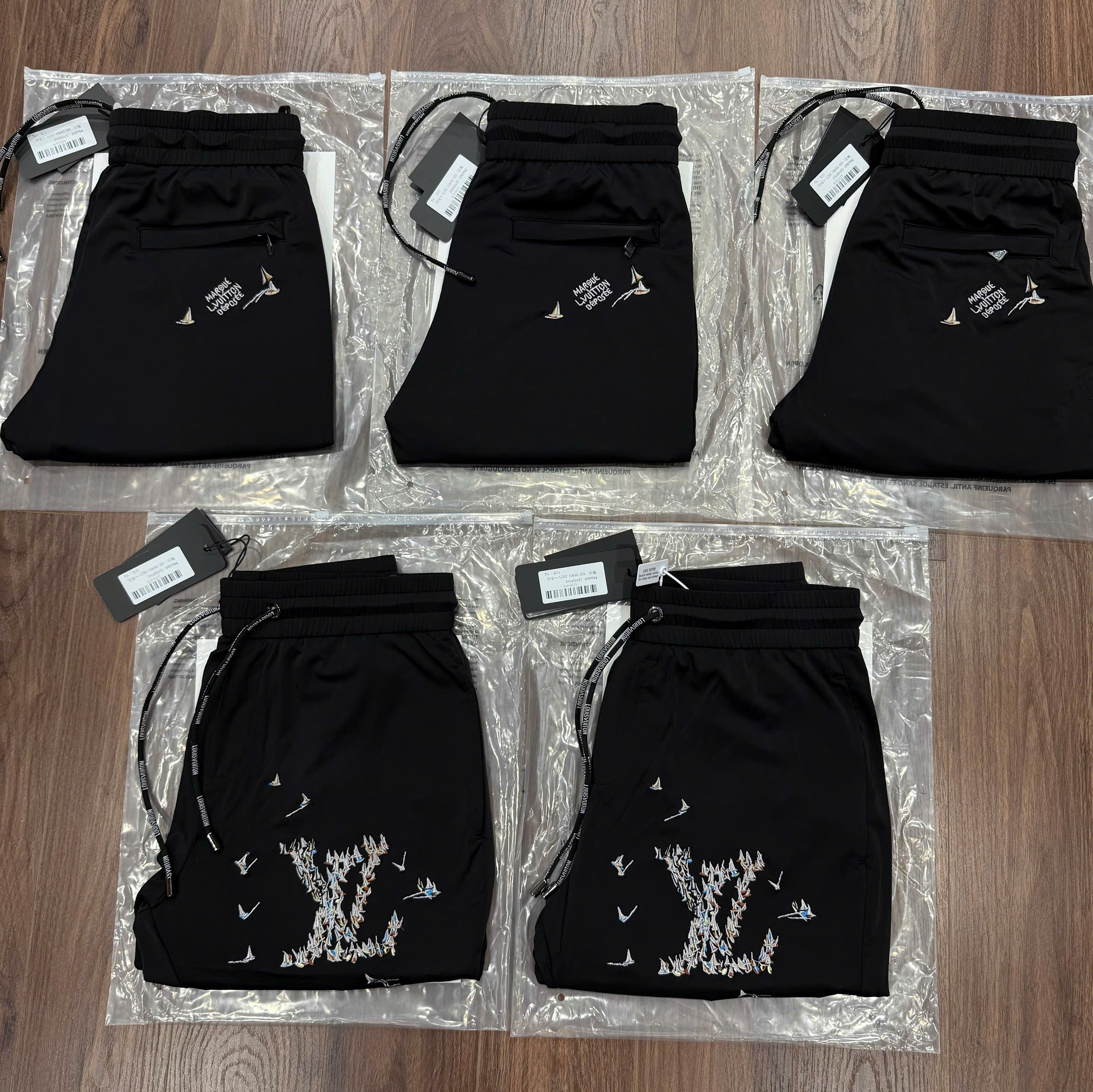 Quần short gió Louis Vuitton LV Đen logo họa tiết thuyền Like Auth CD