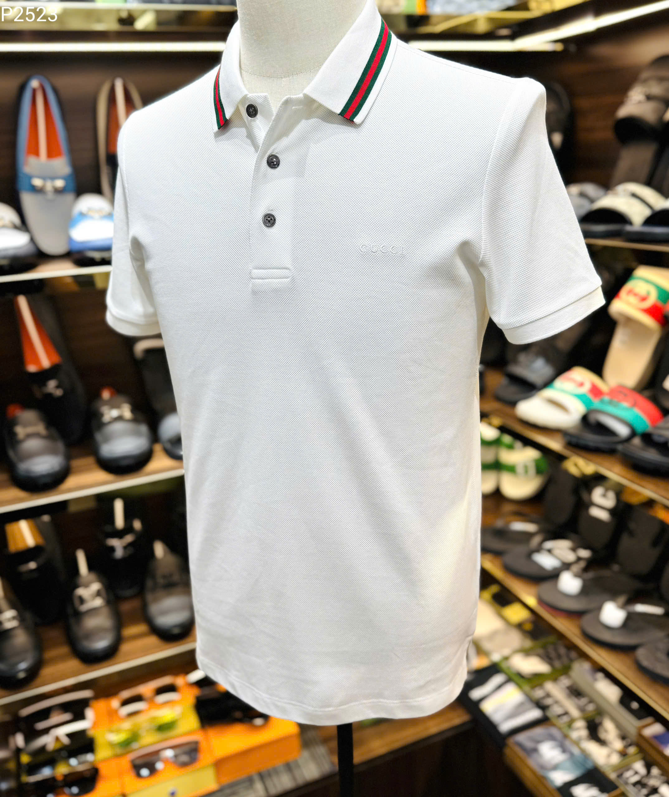 Áo polo Gucci GC logo chữ thêu ngực phối kẻ sọc Xanh Đỏ cổ Like Auth MK