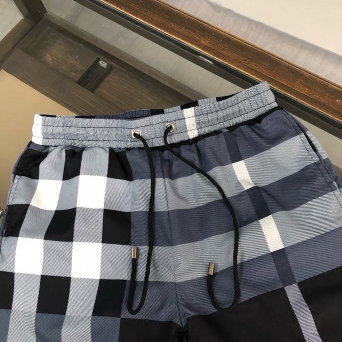 Quần short gió Burberry BBR Xanh kẻ sọc Xám to Like Auth VTN