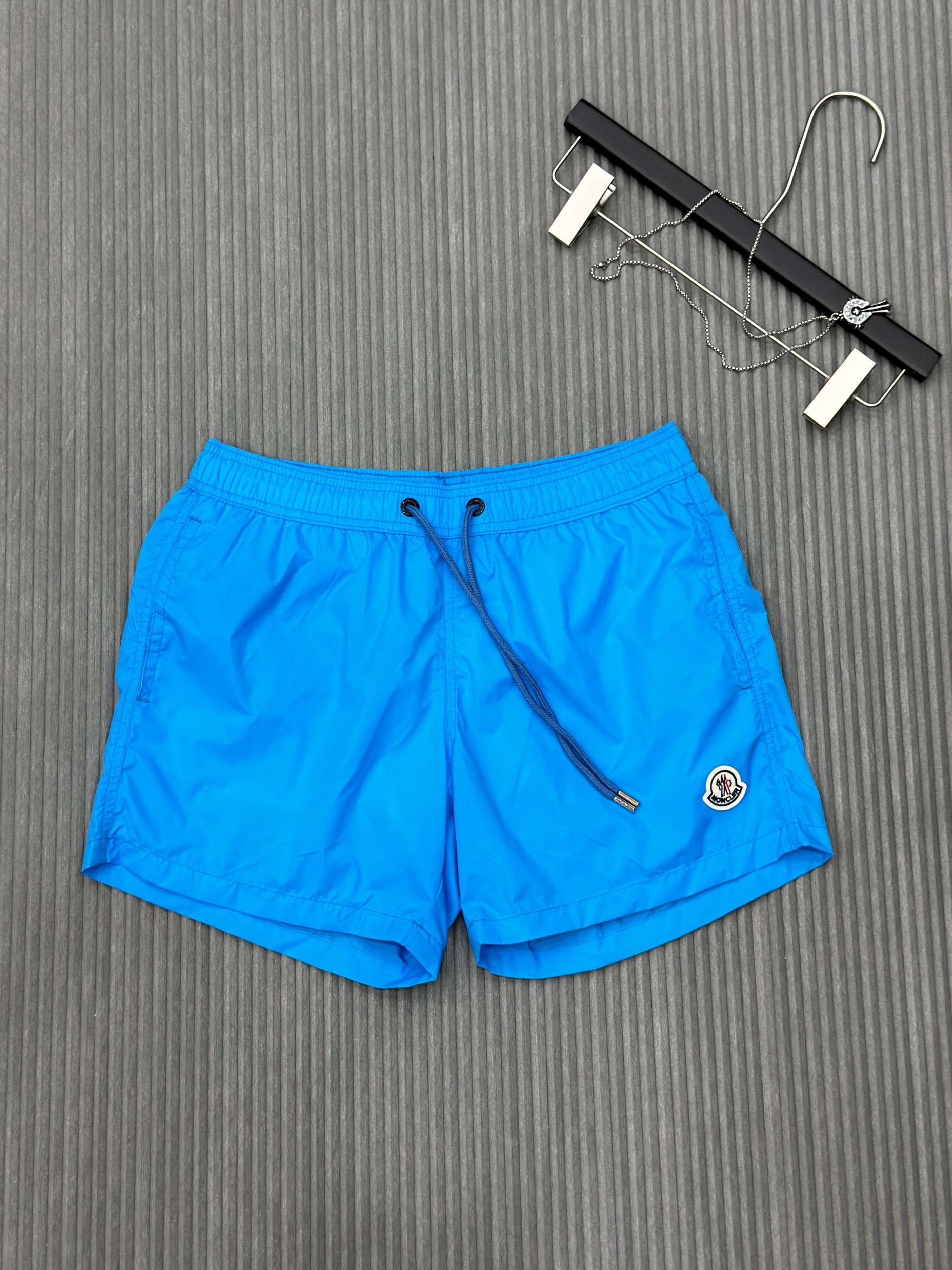 Quần short gió Moncler M Xanh dương trơn logo tròn thêu đùi Like Auth VTN