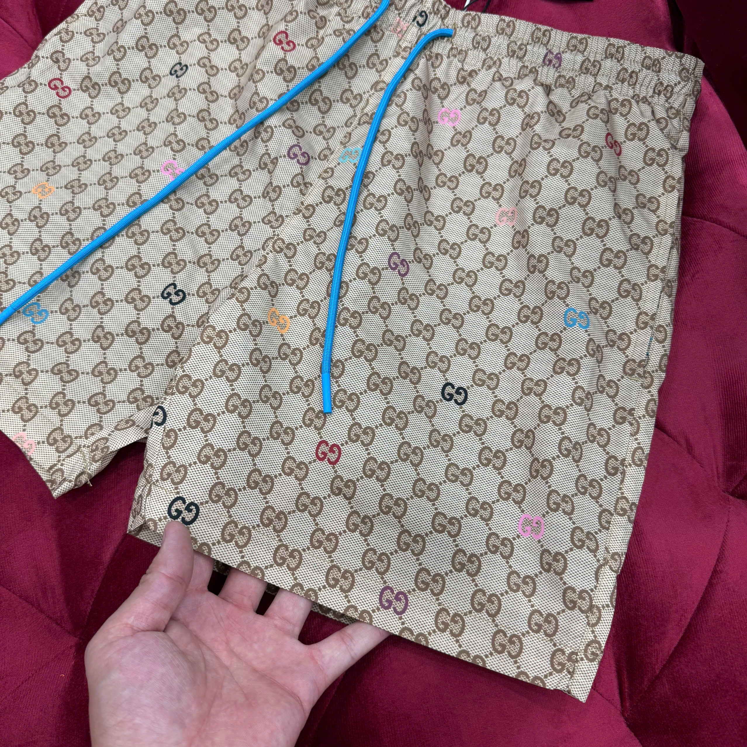 Quần short gió Gucci GC Nâu họa tiết monogram full phối dây Xanh Like Auth CD