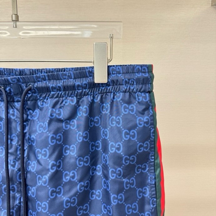 Quần short gió Gucci GC Xanh dương họa tiết monogram kẻ sọc sườn Đỏ Like Auth VTN