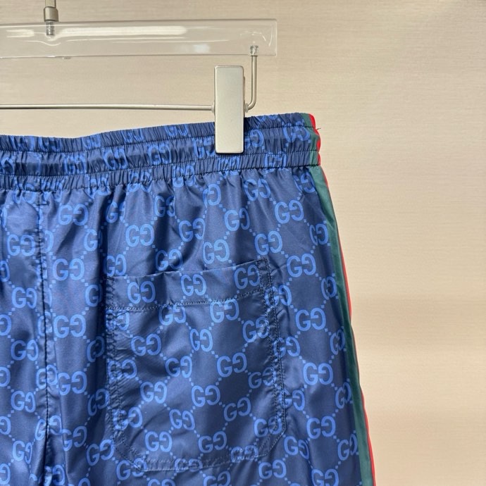 Quần short gió Gucci GC Xanh dương họa tiết monogram kẻ sọc sườn Đỏ Like Auth VTN