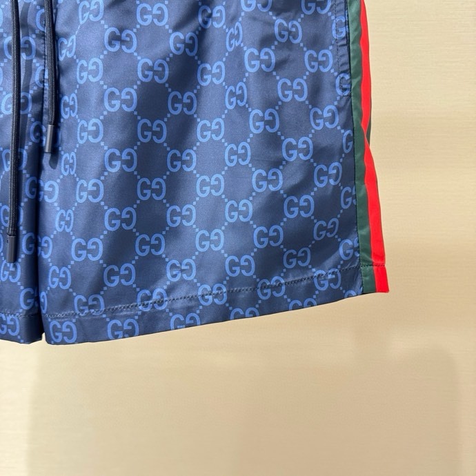 Quần short gió Gucci GC Xanh dương họa tiết monogram kẻ sọc sườn Đỏ Like Auth VTN