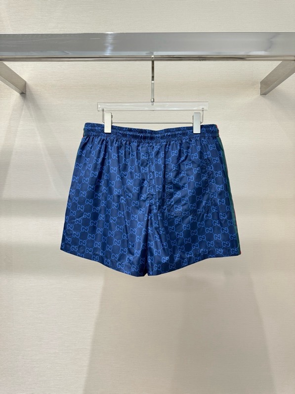 Quần short gió Gucci GC Xanh dương họa tiết monogram kẻ sọc sườn Đỏ Like Auth VTN