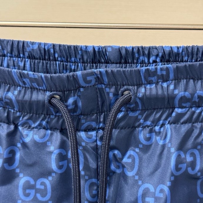 Quần short gió Gucci GC Xanh dương họa tiết monogram kẻ sọc sườn Đỏ Like Auth VTN