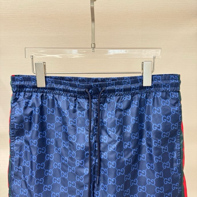 Quần short gió Gucci GC Xanh dương họa tiết monogram kẻ sọc sườn Đỏ Like Auth VTN