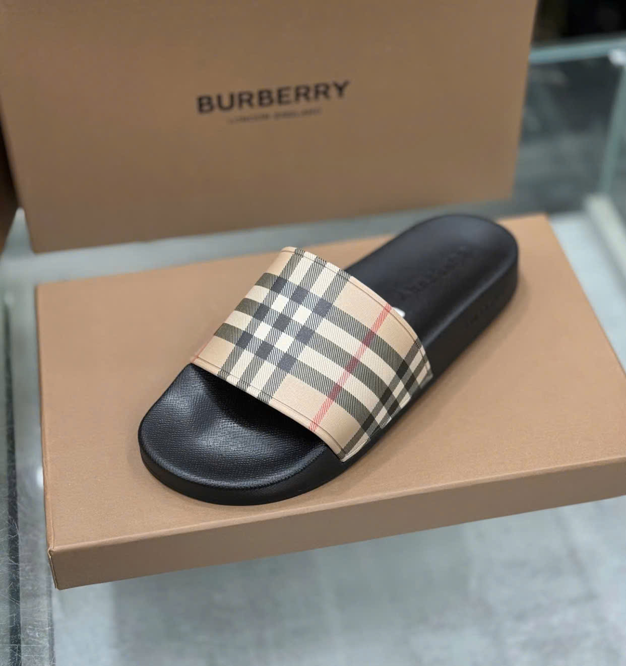 Dép lê quai ngang Burberry BBR Nâu kẻ sọc basic Like Auth on web fullbox bill thẻ DDT