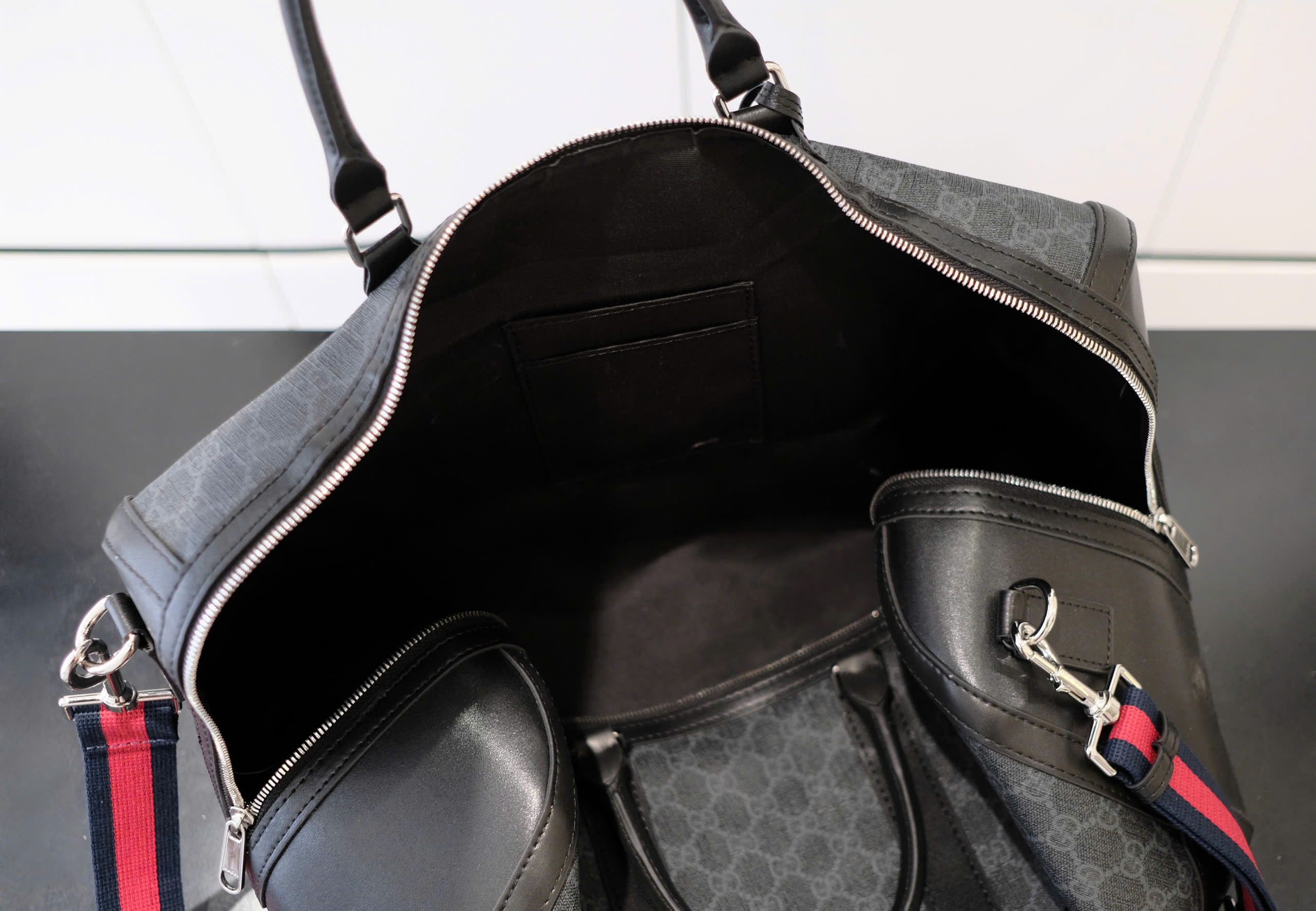 Túi trống du lịch Louis Vuitton LV Đen họa tiết monogram phối Đen trơn size 50cm Like Auth DDT