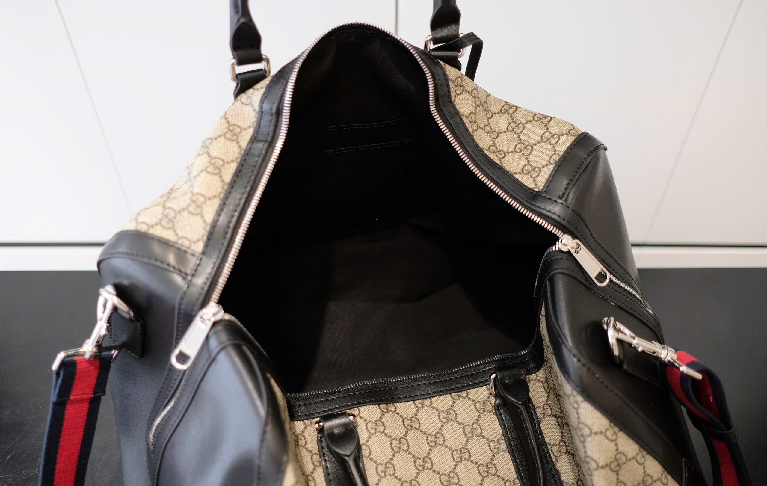 Túi trống du lịch Louis Vuitton LV Nâu họa tiết monogram phối Đen trơn size 50cm Like Auth DDT