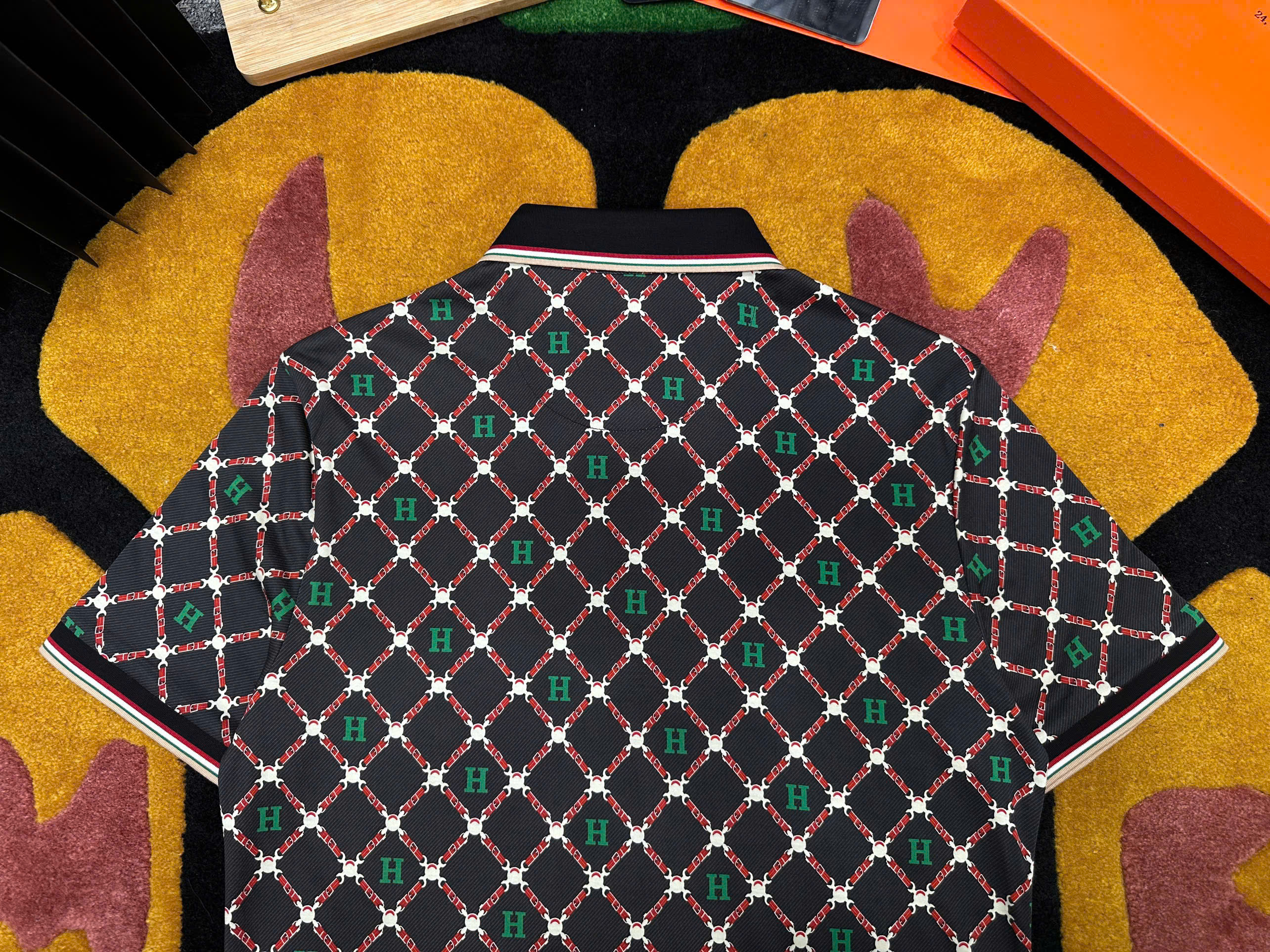 Áo polo Hermes HM Đen họa tiết logo chữ Xanh kẻ sọc Đỏ  Like Auth MK