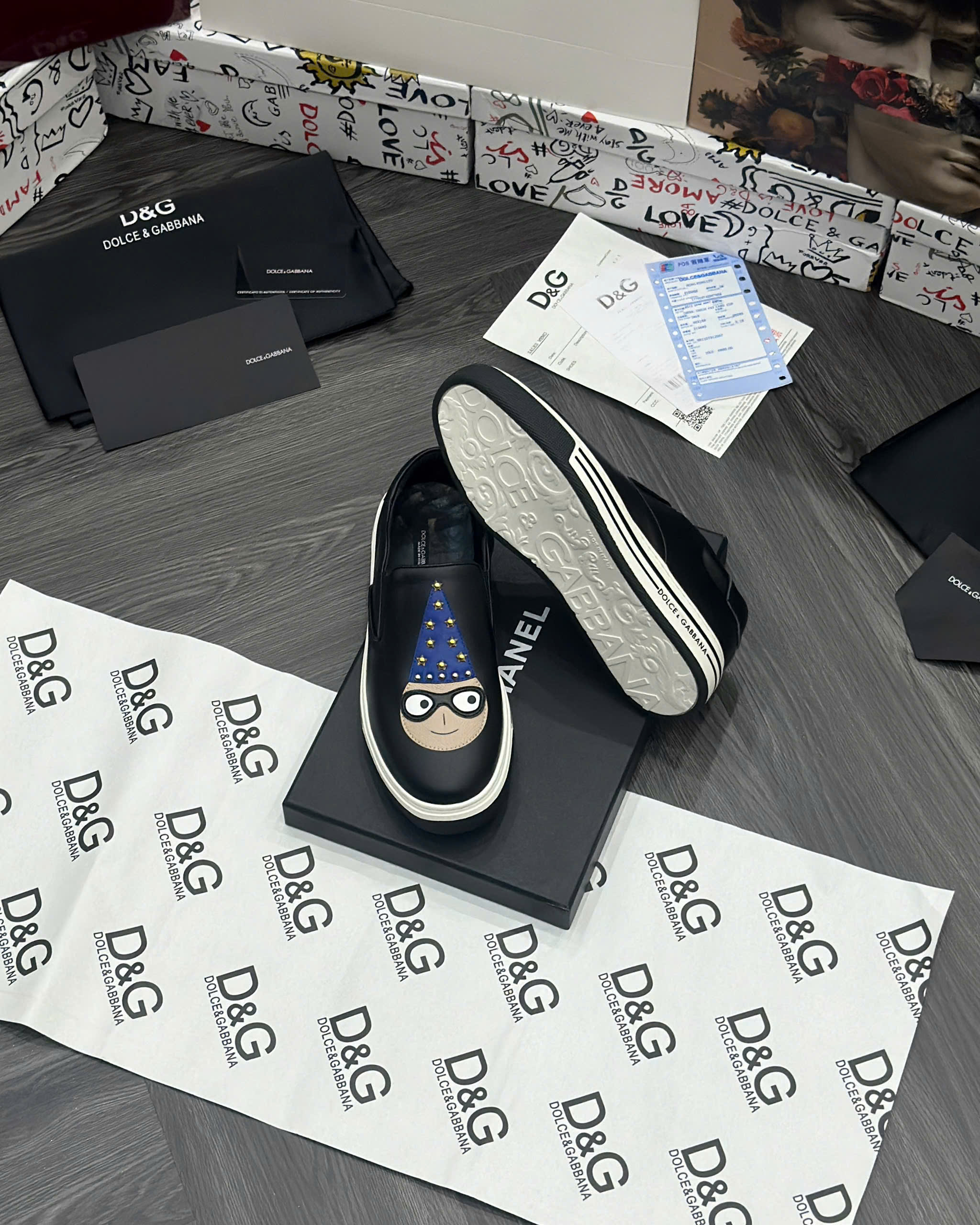 Giày slipon Dolce Gabbana DG Den logo mặt người đội mũ xanh đính đinh Like Auth fullbox MVT