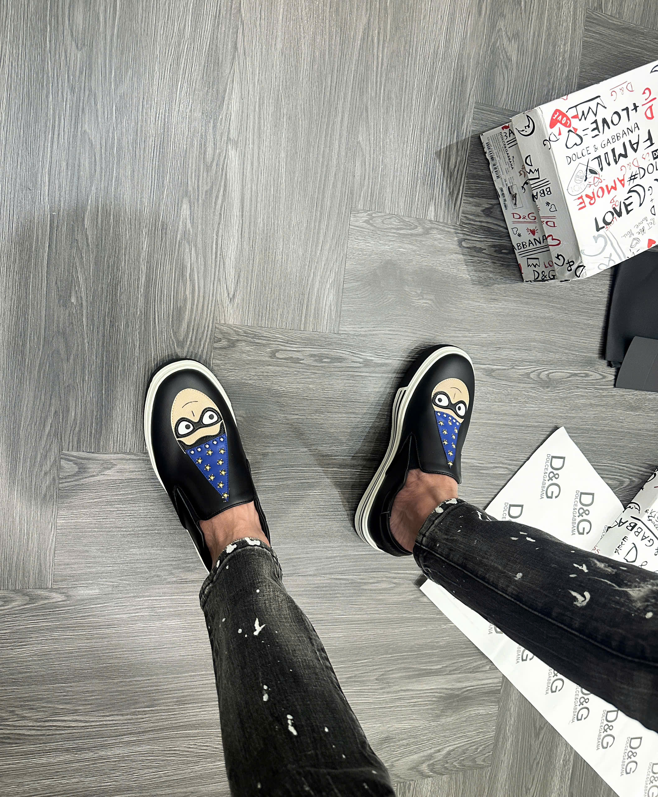 Giày slipon Dolce Gabbana DG Den logo mặt người đội mũ xanh đính đinh Like Auth fullbox MVT