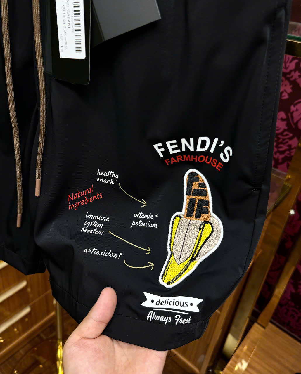 Quần short gió Fendi FF logo chữ chuối đùi Like Auth LK MK