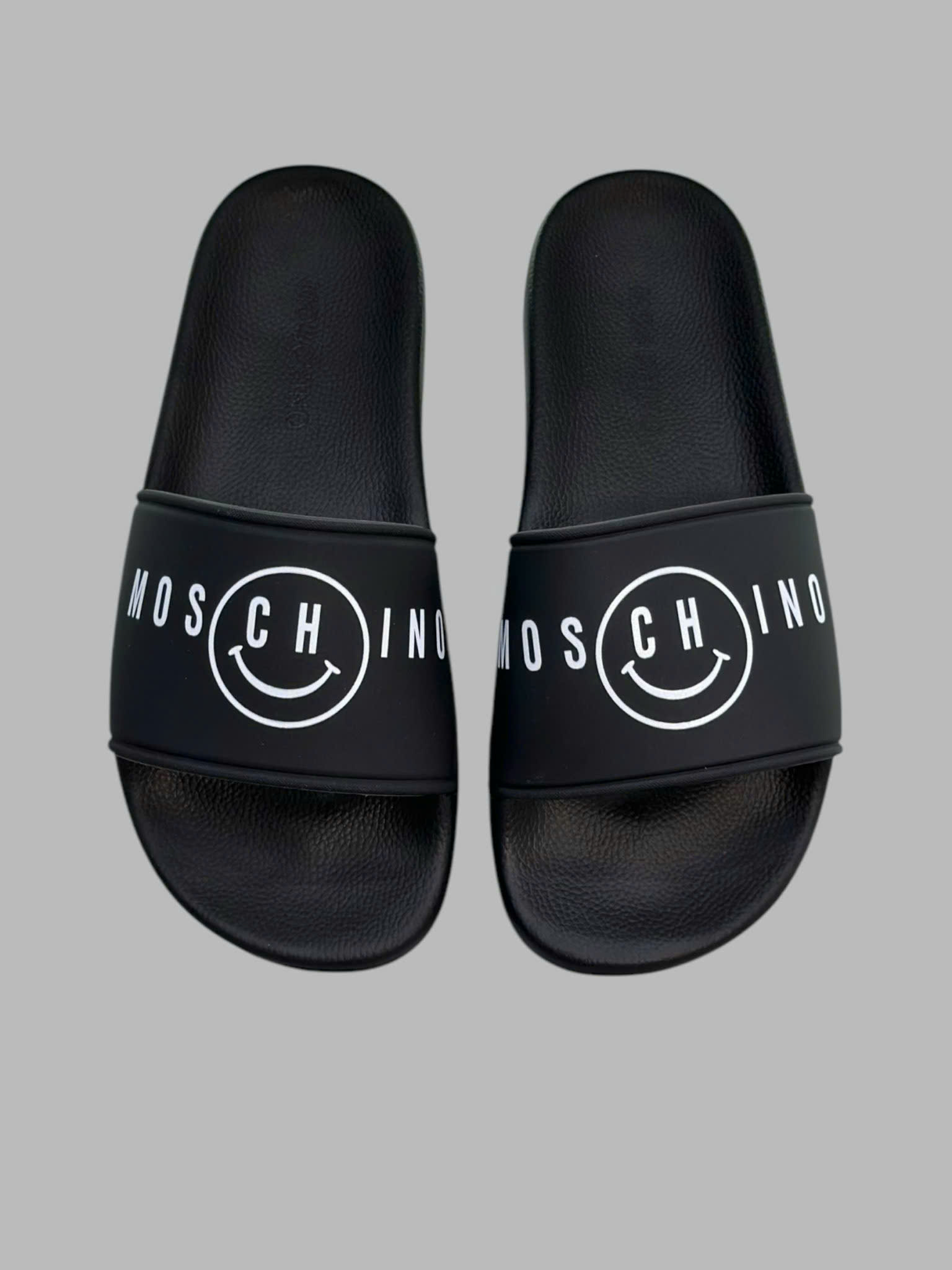 Dép lê quai ngang Moschino M Đen logo chữ mặt cười Trắng Like Auth fullbox VTN