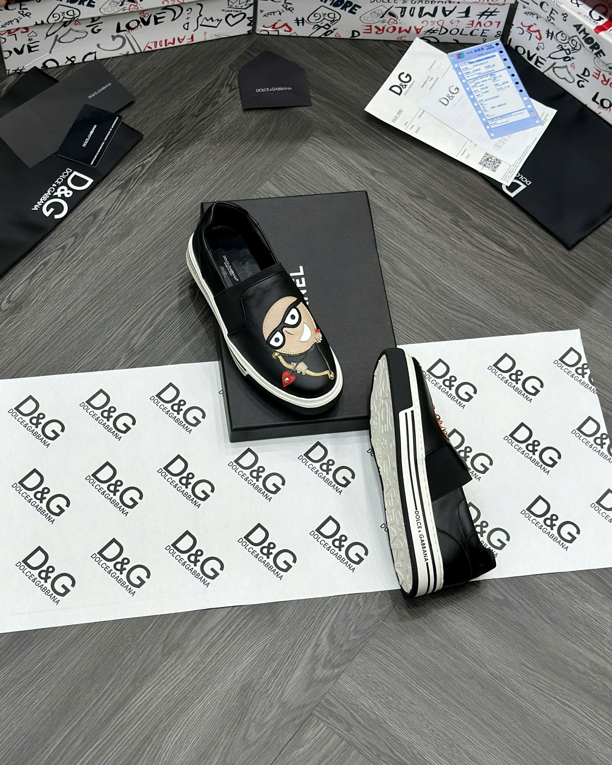 Giày slipon Dolce Gabbana DG Đen mặt người bắn cung trái tim Like Auth fullbox MVT