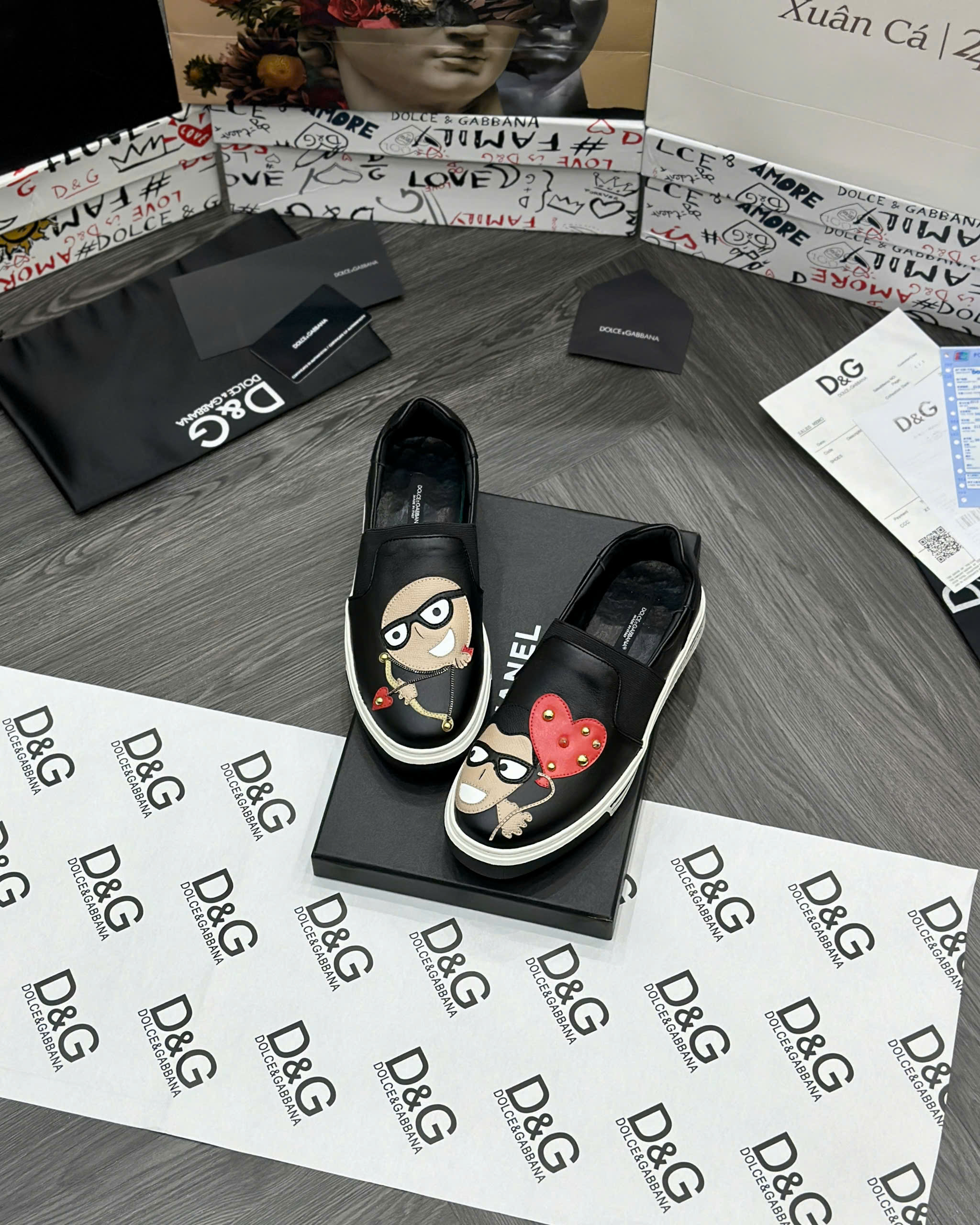 Giày slipon Dolce Gabbana DG Đen mặt người bắn cung trái tim Like Auth fullbox MVT