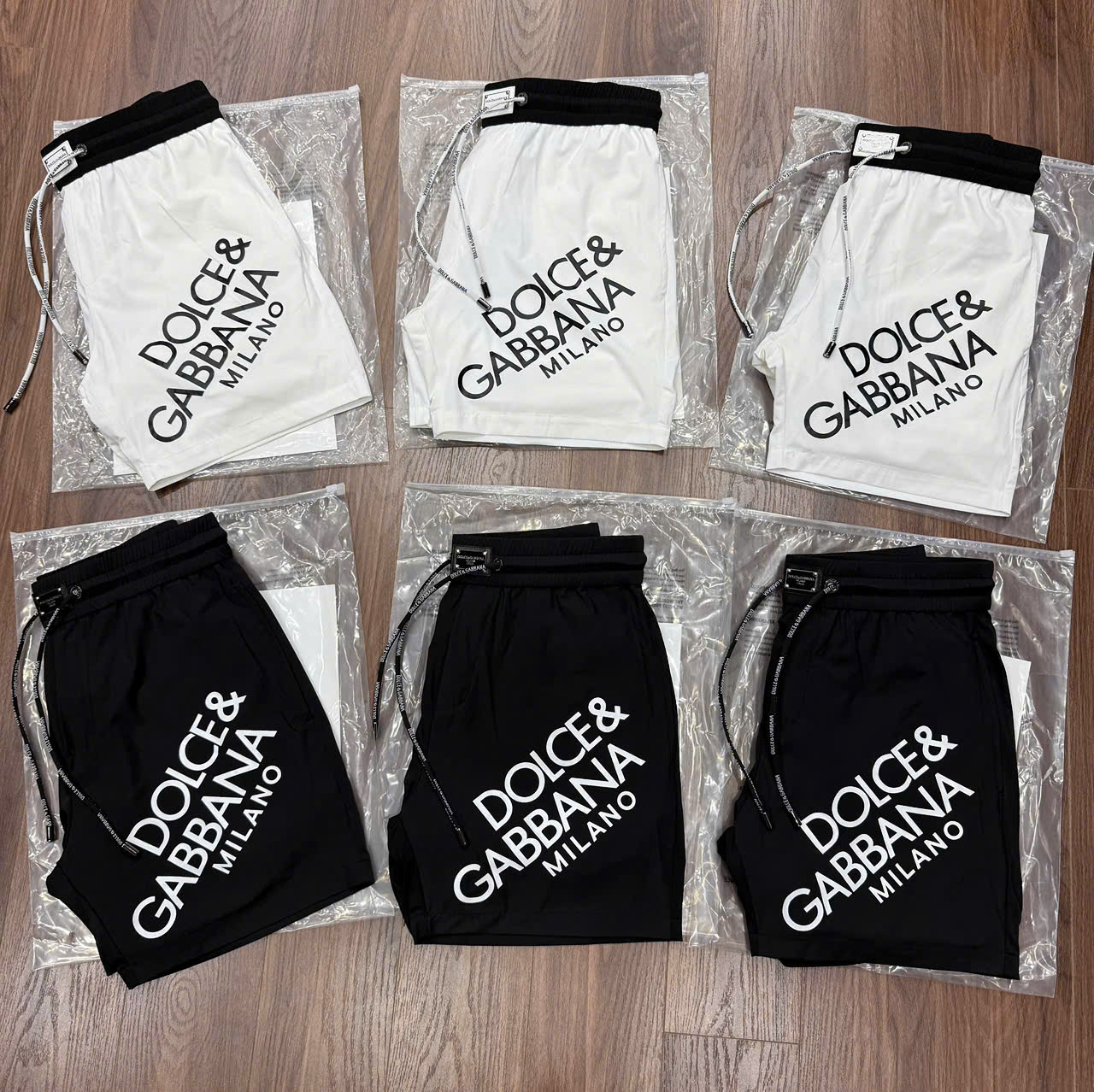 Quần short gió Dolce Gabbana DG logo chữ chéo đùi Like Auth LK