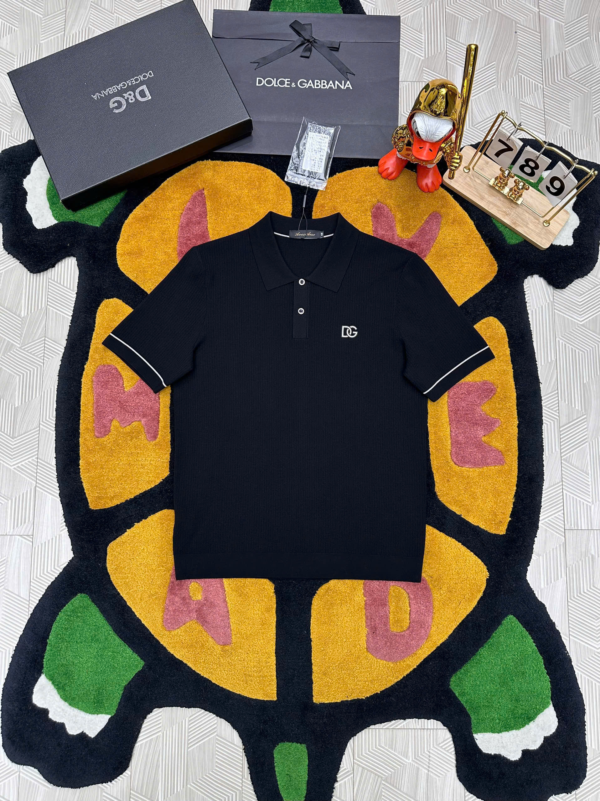 Áo polo len Dolce Gabbana Đen check kẻ Trắng viền ống tay logo DG tag bạc thêu ngực Like Auth 48-52 MK