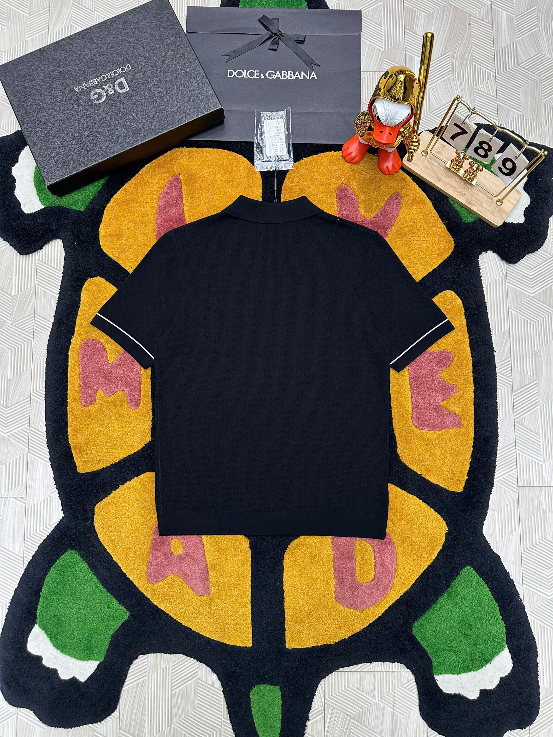 Áo polo len Dolce Gabbana Đen check kẻ Trắng viền ống tay logo DG tag bạc thêu ngực Like Auth 48-52 MK