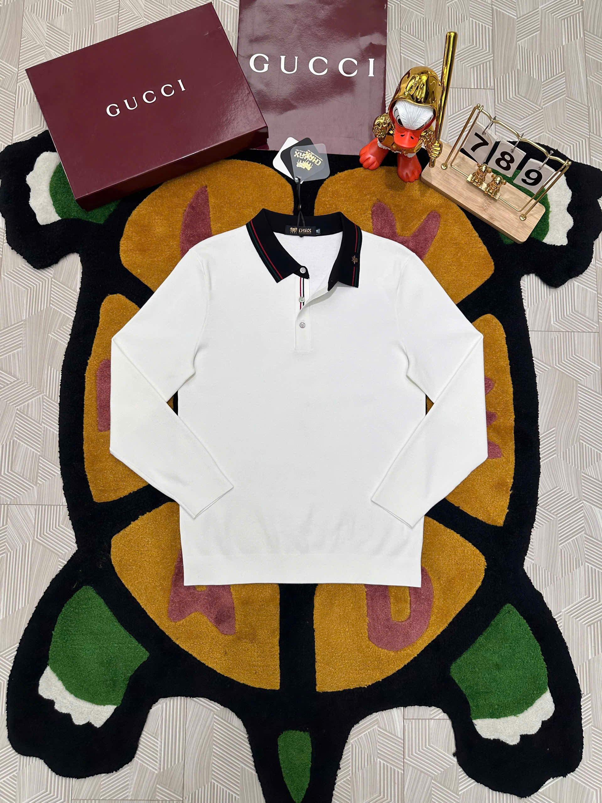 Áo polo len dài tay Dior CD logo thêu check cổ kẻ sọc Like Auth 48-52 MK